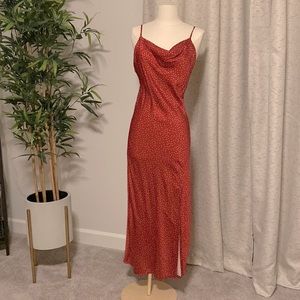 Red silky midi dress with polka dots